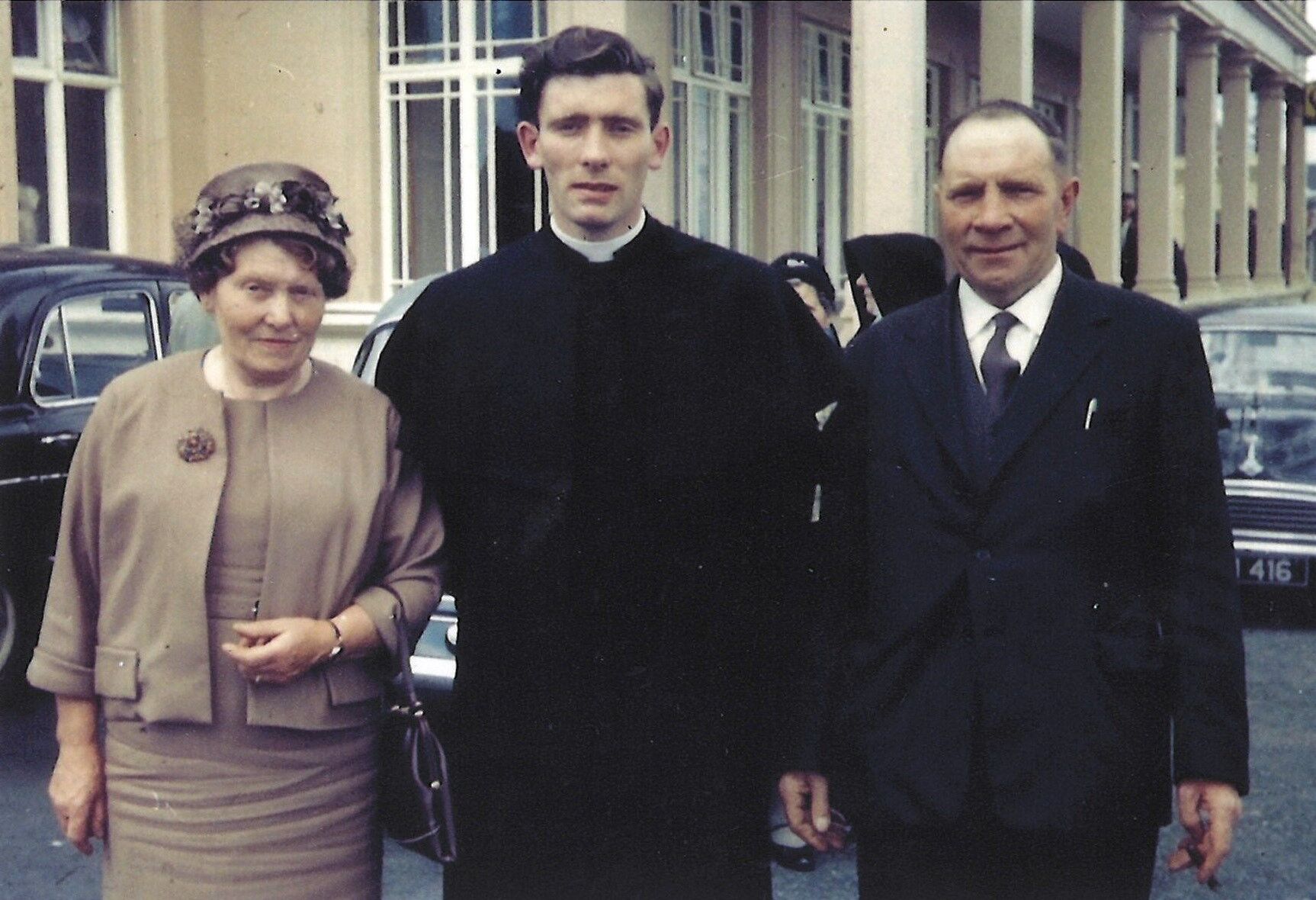 Monsignor John Bluett, June 13, 1963 on the day of his Ordination to the Priesthood, with his parents in Ireland. (COURTESY)